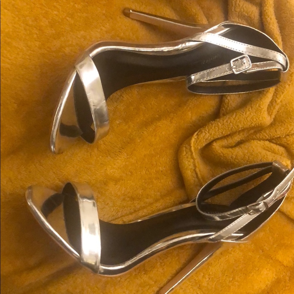 Silver strapless open toe heels